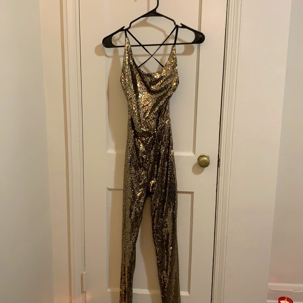Women’s sequin one piece, strappy laced back